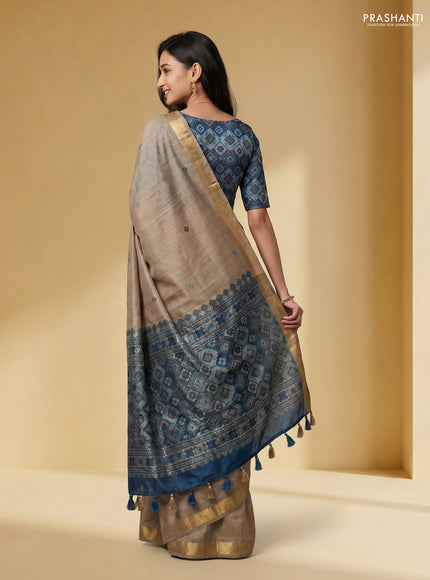Linen cotton saree beige and light blue with thread woven buttas and patola weaving pallu