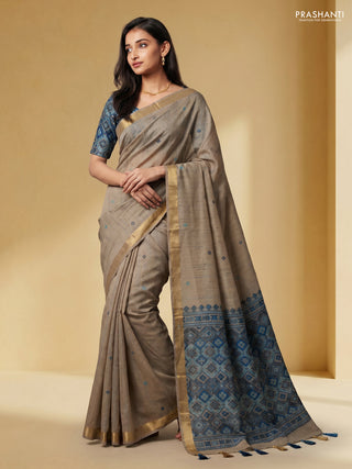 Linen cotton saree beige and light blue with thread woven buttas and patola weaving pallu