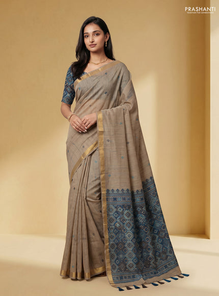 Linen cotton saree beige and light blue with thread woven buttas and patola weaving pallu