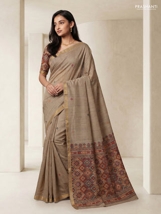 Linen cotton saree beige and orange with thread woven buttas and patola weaving pallu