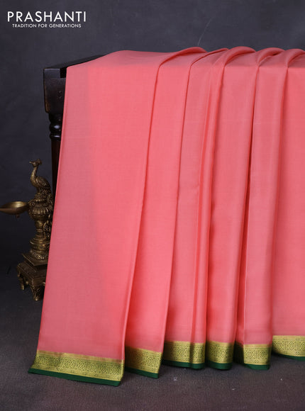 Pure mysore silk saree peach shade and green with plain body and zari woven border