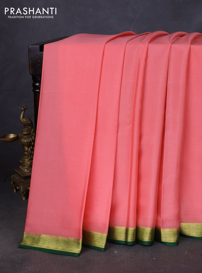 Pure mysore silk saree peach shade and green with plain body and zari woven border