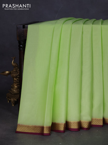 Pure mysore silk saree fluorescent green and wine shade with plain body and zari woven border