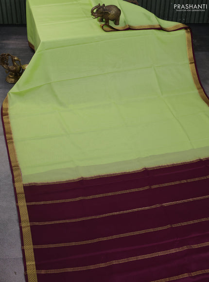 Pure mysore silk saree fluorescent green and wine shade with plain body and zari woven border