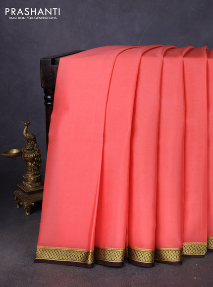 Pure mysore silk saree peach shade and coffee brown with plain body and zari woven border