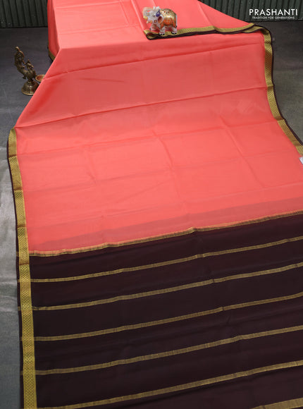 Pure mysore silk saree peach shade and coffee brown with plain body and zari woven border