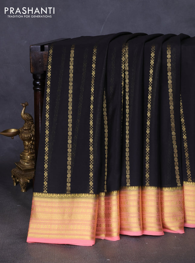 Pure mysore silk saree black and peach shade with plain body and rettapet zari woven border