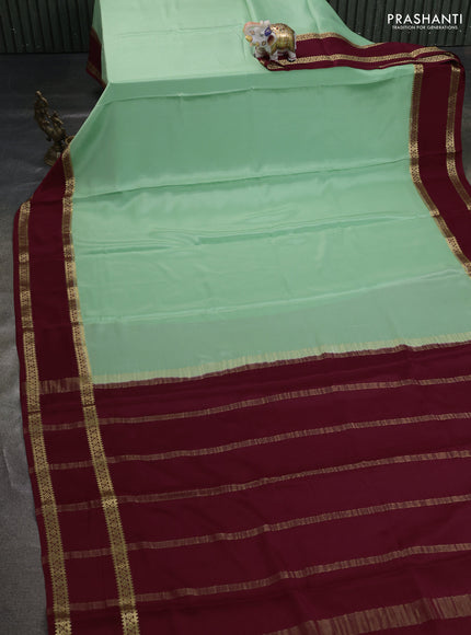 Pure mysore silk saree pista green and maroon with plain body and rettapet zari woven border