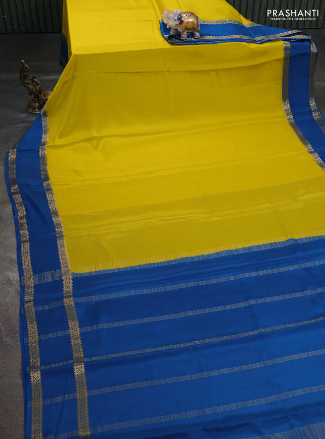 Pure mysore silk saree lime yellow and cs blue with plain body and rettapet zari woven border