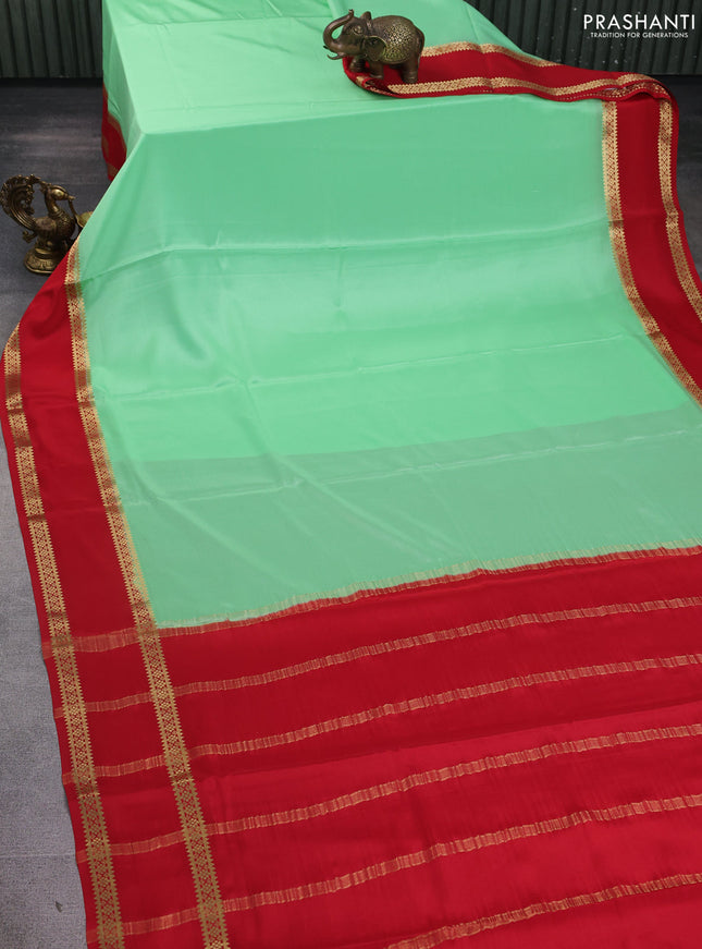 Pure mysore silk saree teal green and red with plain body and rettapet zari woven border