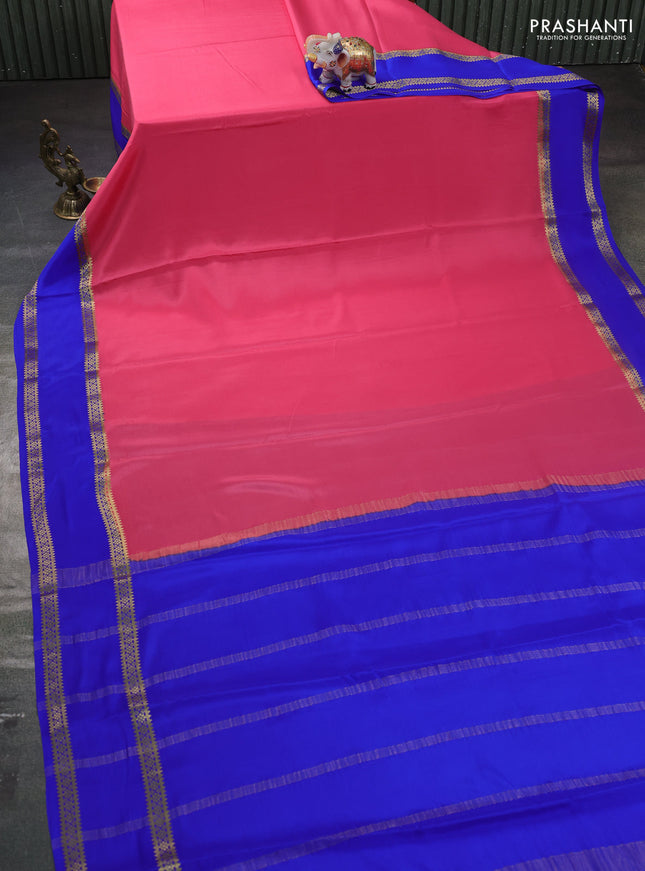 Pure mysore silk saree peach pink and blue with plain body and rettapet zari woven border