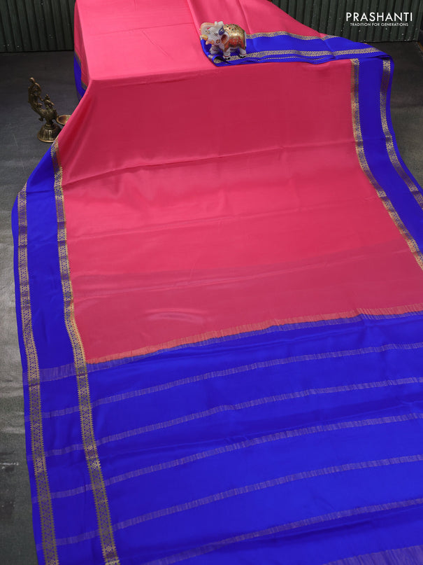 Pure mysore silk saree peach pink and blue with plain body and rettapet zari woven border