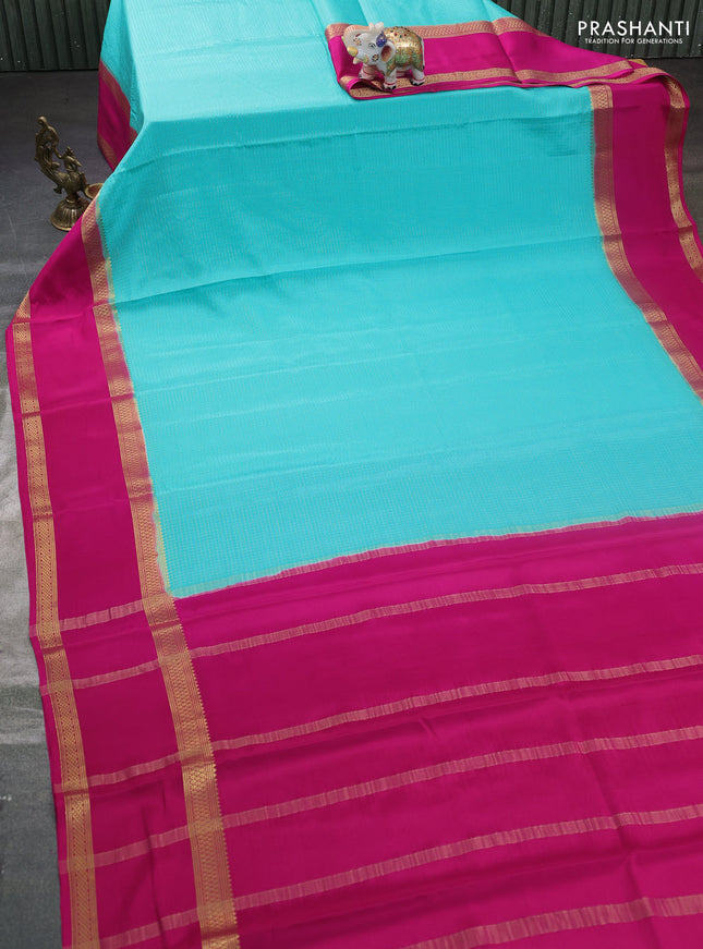 Pure mysore silk saree teal blue and pink with allover zari woven checked pattern and rettapet zari woven border