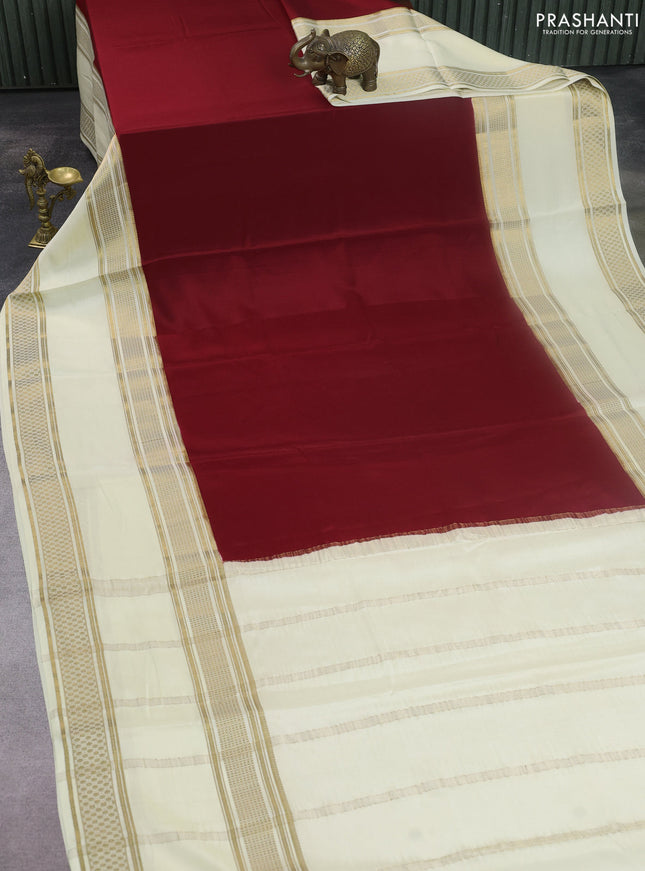 Pure mysore silk saree maroon and cream with plain body and rettapet zari woven border