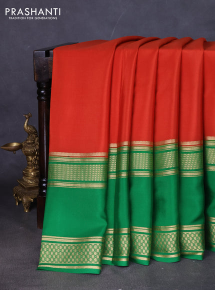Pure mysore silk saree rust shade and green with plain body and rettapet zari woven border