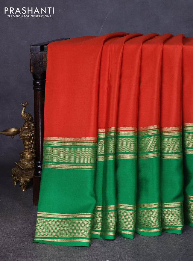 Pure mysore silk saree rust shade and green with plain body and rettapet zari woven border