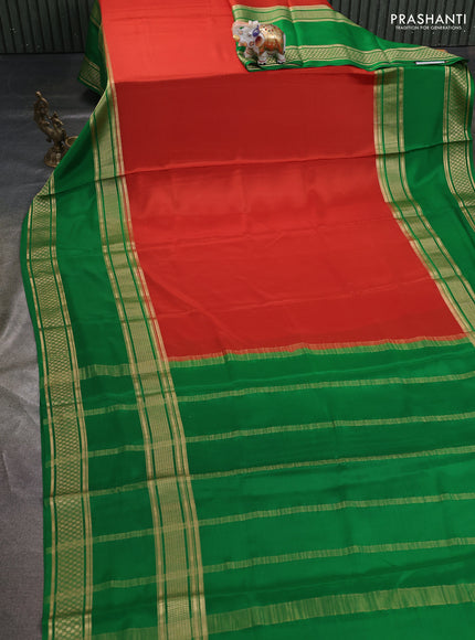 Pure mysore silk saree rust shade and green with plain body and rettapet zari woven border