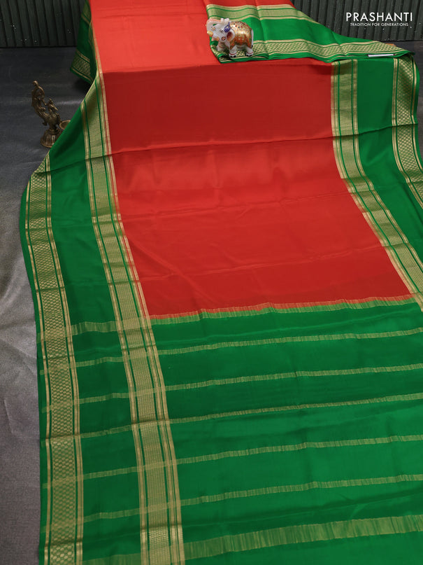 Pure mysore silk saree rust shade and green with plain body and rettapet zari woven border