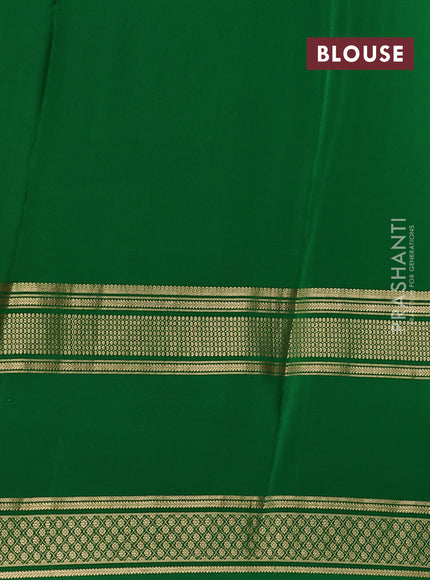 Pure mysore silk saree rust shade and green with plain body and rettapet zari woven border