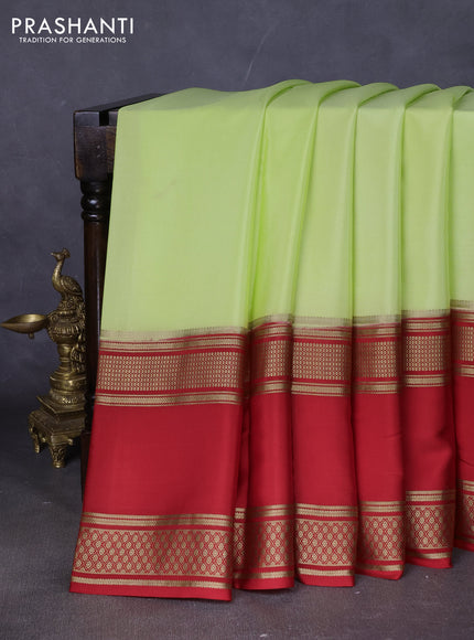 Pure mysore silk saree fluorescent green and red with plain body and rettapet zari woven border