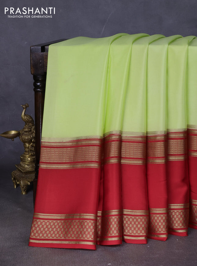 Pure mysore silk saree fluorescent green and red with plain body and rettapet zari woven border