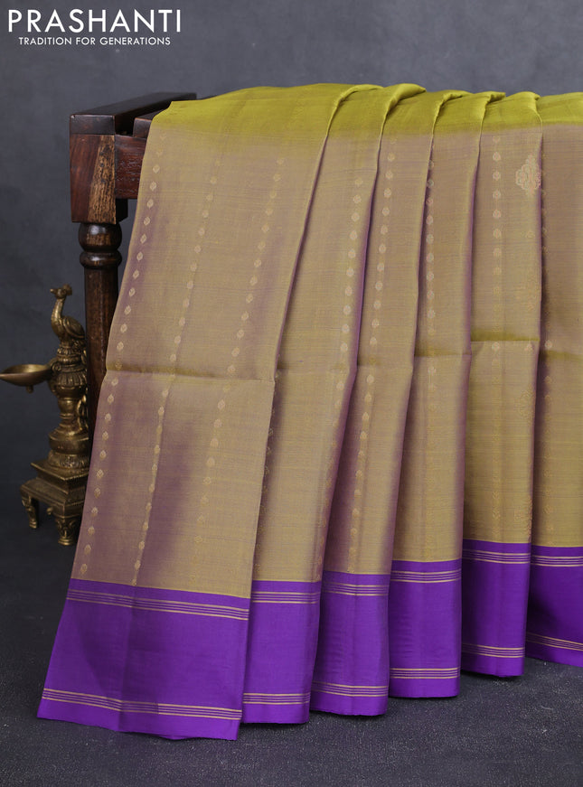 Kanchipuram soft silk saree dual shade of mehendi green and violet with allover zari woven buttas and rettapet zari woven border