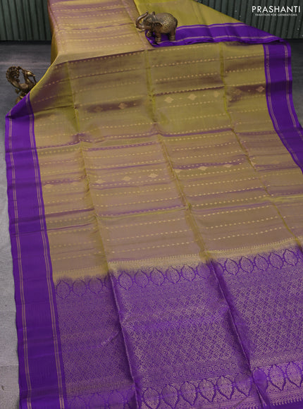 Kanchipuram soft silk saree dual shade of mehendi green and violet with allover zari woven buttas and rettapet zari woven border