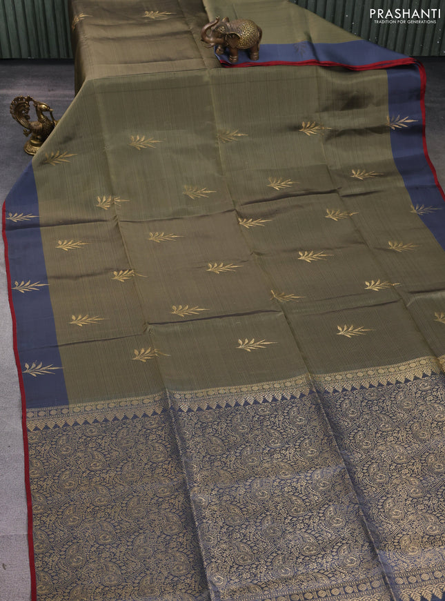 Kanchipuram soft silk saree pastel green and grey with zari woven buttas and zari woven butta border