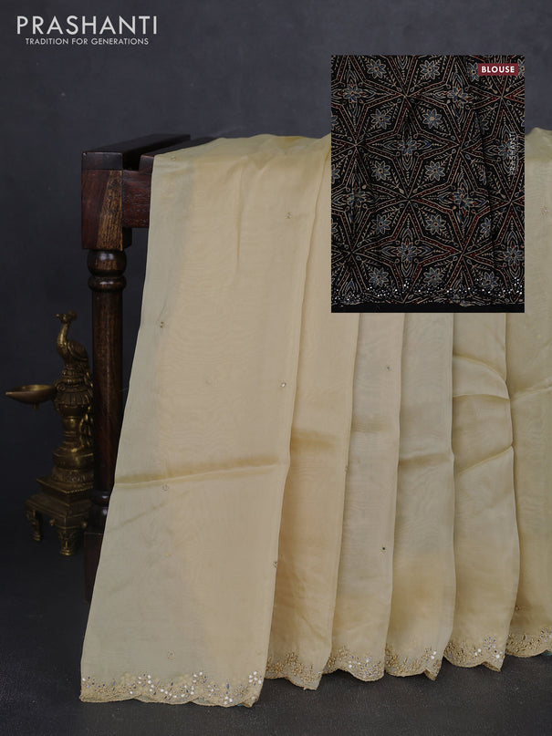 Satin organza silk saree cream and black with mirror embroidery work and ajrakh printed blouse