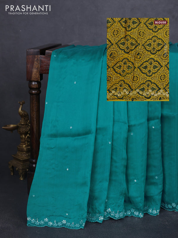 Satin organza silk saree teal green shade and mustard yellow with mirror embroidery work and ajrakh printed blouse