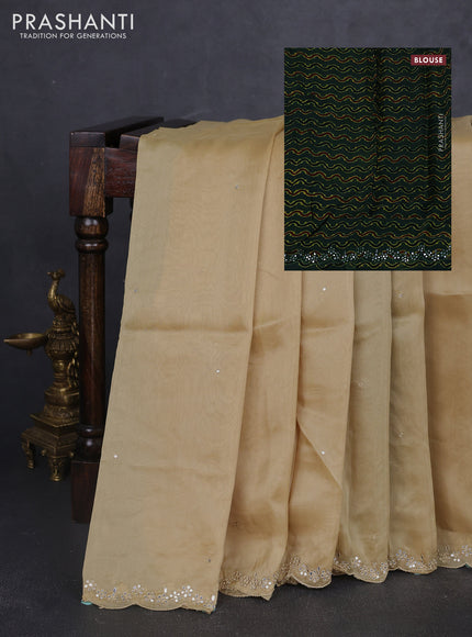 Satin organza silk saree beige and bottle green with mirror embroidery work and ajrakh printed blouse