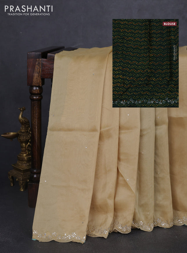 Satin organza silk saree beige and bottle green with mirror embroidery work and ajrakh printed blouse