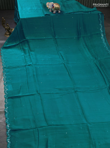 Satin organza silk saree teal blue and cream with mirror embroidery work and ajrakh printed blouse