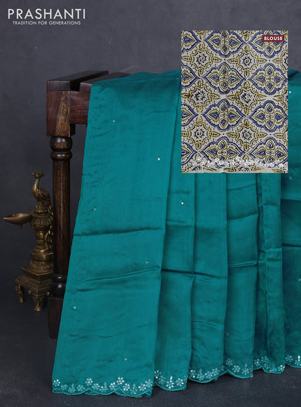 Satin organza silk saree teal blue and cream with mirror embroidery work and ajrakh printed blouse