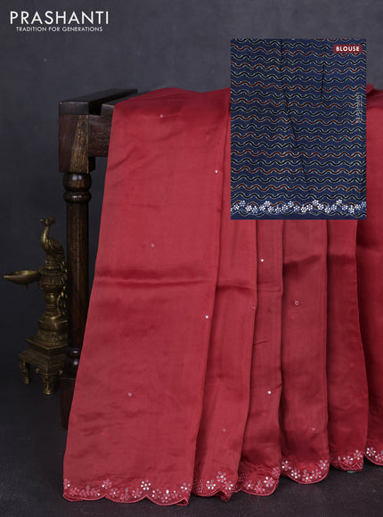 Satin organza silk saree rust shade and indigo blue with mirror embroidery work and ajrakh printed blouse
