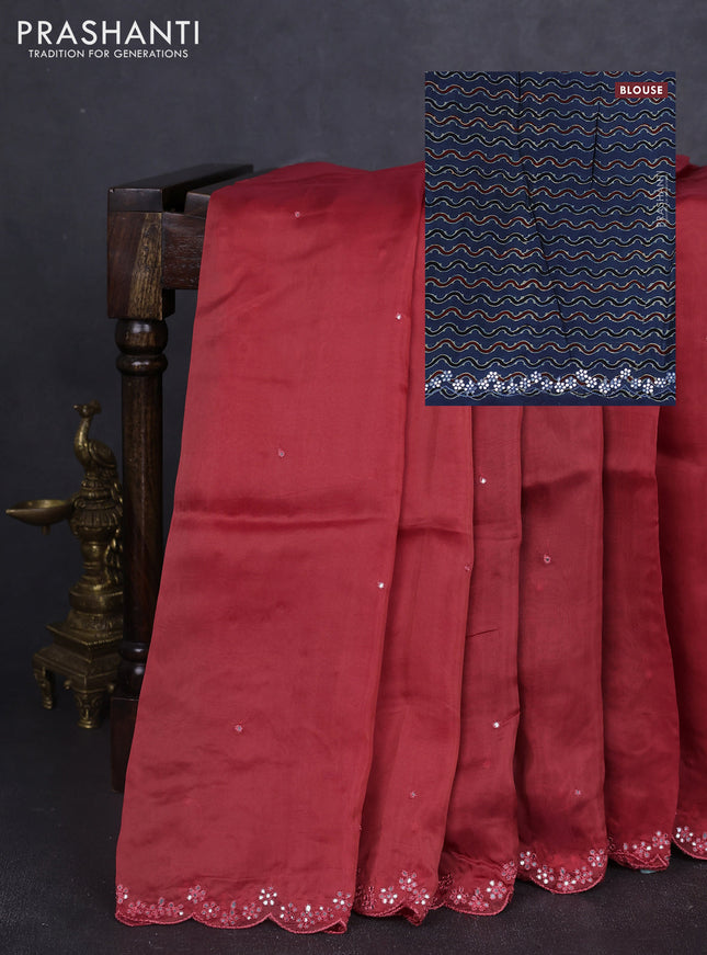 Satin organza silk saree rust shade and indigo blue with mirror embroidery work and ajrakh printed blouse