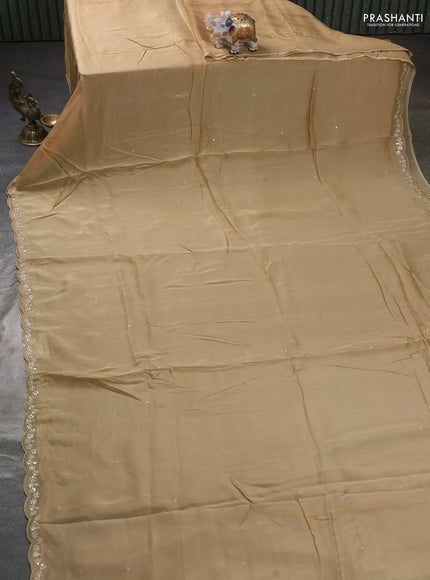 Satin organza silk saree beige and indigo blue with mirror embroidery work and ajrakh printed blouse