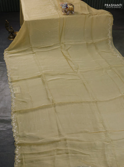 Satin organza silk saree cream and indigo blue with mirror embroidery work and ajrakh printed blouse