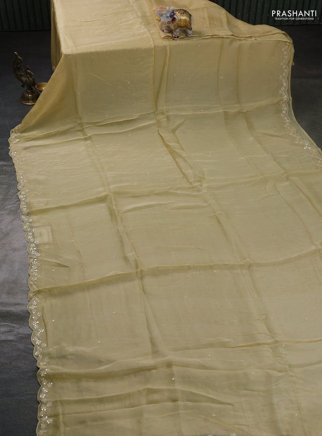 Satin organza silk saree cream and indigo blue with mirror embroidery work and ajrakh printed blouse
