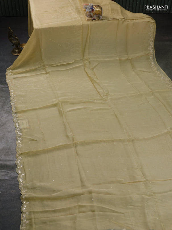 Satin organza silk saree cream and indigo blue with mirror embroidery work and ajrakh printed blouse