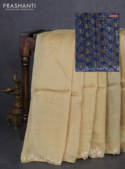Satin organza silk saree cream and indigo blue with mirror embroidery work and ajrakh printed blouse