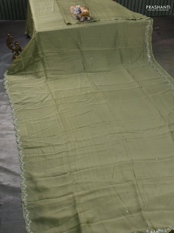 Satin organza silk saree pastel green and mustard yellow with mirror embroidery work and ajrakh printed blouse