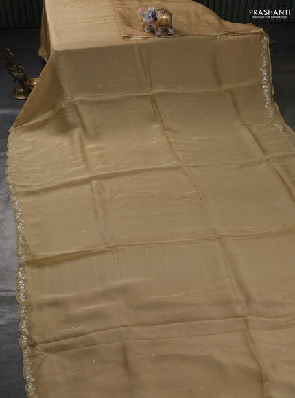 Satin organza silk saree beige and rustic maroon with mirror embroidery work and ajrakh printed blouse