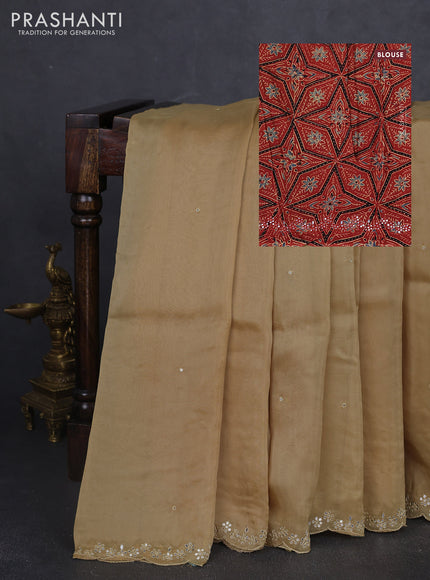 Satin organza silk saree beige and rustic maroon with mirror embroidery work and ajrakh printed blouse