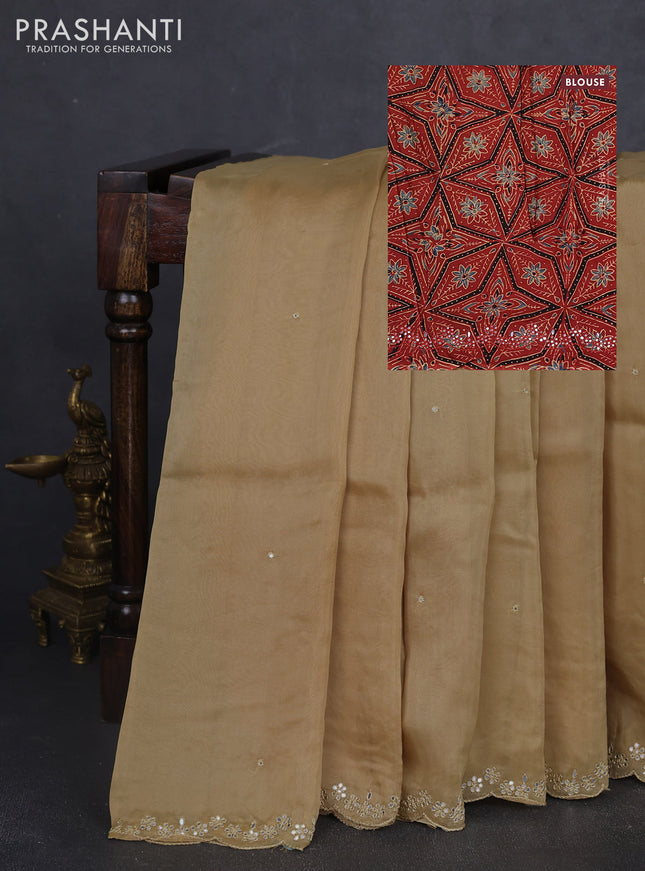 Satin organza silk saree beige and rustic maroon with mirror embroidery work and ajrakh printed blouse