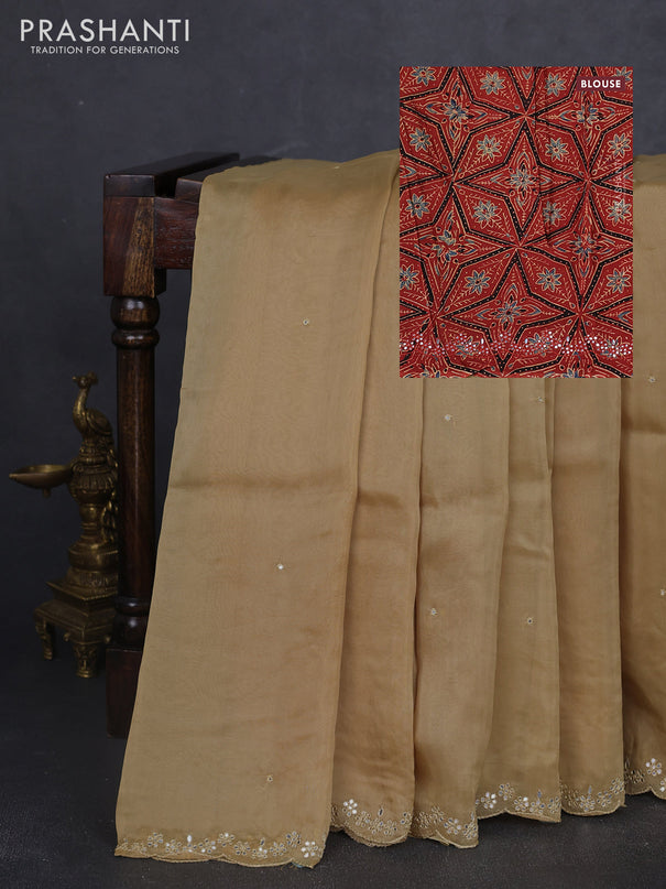 Satin organza silk saree beige and rustic maroon with mirror embroidery work and ajrakh printed blouse