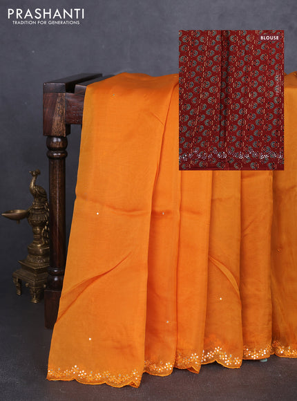 Satin organza silk saree mustard yellow and rustic maroon with mirror embroidery work and ajrakh printed blouse