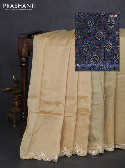 Satin organza silk saree cream and indigo blue with mirror embroidery work and ajrakh printed blouse