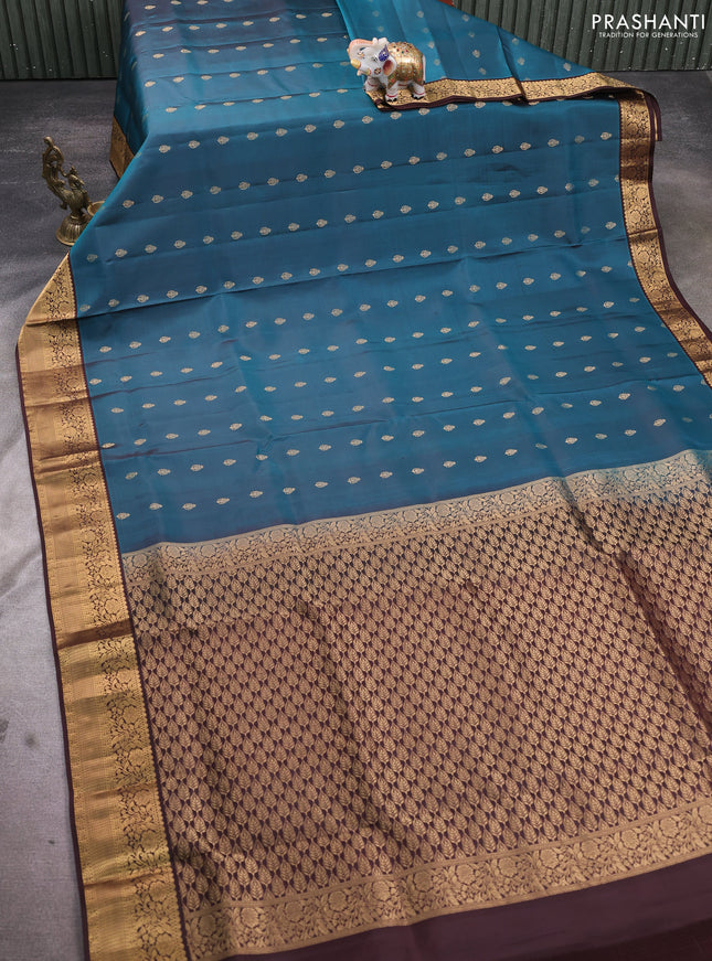 Pure soft silk saree peacock green and brown with allover zari woven buttas and zari woven floral border