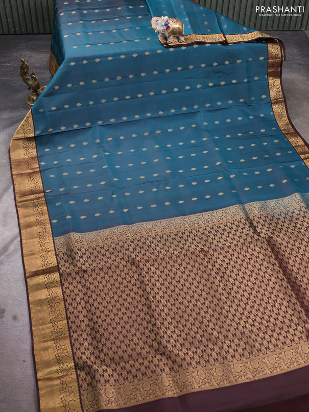 Pure soft silk saree peacock green and brown with allover zari woven buttas and zari woven floral border